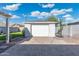 This detached garage provides storage and workspace with an exterior basketball hoop at 1618 W Culver St, Phoenix, AZ 85007