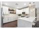 Well-equipped kitchen featuring white cabinets, stainless steel appliances and island at 1618 W Culver St, Phoenix, AZ 85007