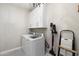 Convenient laundry room with washer, dryer, and storage cabinets at 1618 W Culver St, Phoenix, AZ 85007