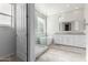 Modern bathroom with soaking tub, glass shower, and white cabinets at 18196 N 92Nd St, Scottsdale, AZ 85255