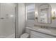 Modern bathroom with white vanity, gold fixtures, and a walk-in shower at 18196 N 92Nd St, Scottsdale, AZ 85255