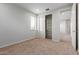 Spacious bedroom with carpet flooring and built-in shelving at 18196 N 92Nd St, Scottsdale, AZ 85255
