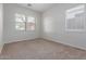 Spacious bedroom with neutral carpeting and ample natural light at 18196 N 92Nd St, Scottsdale, AZ 85255