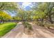 Curving concrete pathway through a lush, landscaped community area at 18196 N 92Nd St, Scottsdale, AZ 85255