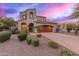 Beautiful two-story home with a Spanish-style design and landscaped yard at 18196 N 92Nd St, Scottsdale, AZ 85255