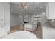 Modern kitchen with island and adjacent dining area with chandelier at 18196 N 92Nd St, Scottsdale, AZ 85255