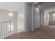 Spacious loft area with built in storage and carpet flooring at 18196 N 92Nd St, Scottsdale, AZ 85255