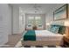 Main bedroom with built-in white cabinets and plush carpeting at 18196 N 92Nd St, Scottsdale, AZ 85255