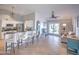 Open concept kitchen flows into living area with breakfast bar at 18825 N 40Th Pl, Phoenix, AZ 85050