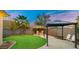 Backyard patio with gazebo, string lights, and seating at 21752 E Estrella Rd, Queen Creek, AZ 85142