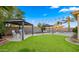 Relaxing backyard oasis with a pool and gazebo at 21752 E Estrella Rd, Queen Creek, AZ 85142