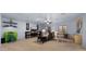 Spacious basement with seating area and built-in shelving at 21752 E Estrella Rd, Queen Creek, AZ 85142