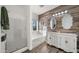 Elegant bathroom with soaking tub, walk-in shower, and double vanity at 21752 E Estrella Rd, Queen Creek, AZ 85142