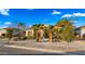 Single-story home with palm trees and curb appeal at 21752 E Estrella Rd, Queen Creek, AZ 85142