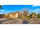 Single-story home with a two-car garage and desert landscaping at 21752 E Estrella Rd, Queen Creek, AZ 85142