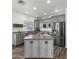 Large kitchen island with granite countertop and ample storage at 21752 E Estrella Rd, Queen Creek, AZ 85142