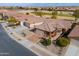 Single-story home with two-car garage, desert landscaping, and golf course views at 22 S Mesilla Ln, Casa Grande, AZ 85194