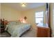 Spacious bedroom with a king-size bed and ample natural light at 22 S Mesilla Ln, Casa Grande, AZ 85194