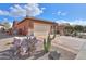 Front yard view of a house with cacti and gravel landscaping at 22 S Mesilla Ln, Casa Grande, AZ 85194