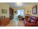 Home office features built-in shelving, a comfortable couch, and a dedicated workspace at 22 S Mesilla Ln, Casa Grande, AZ 85194