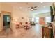 Living room features comfortable seating and a ceiling fan at 22 S Mesilla Ln, Casa Grande, AZ 85194
