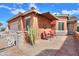 Covered patio with seating area, creating an inviting outdoor space at 22 S Mesilla Ln, Casa Grande, AZ 85194