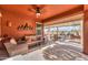 Relaxing covered patio with seating area and outdoor dining at 22 S Mesilla Ln, Casa Grande, AZ 85194