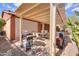 Covered patio with built-in grill and ample seating at 22 S Mesilla Ln, Casa Grande, AZ 85194