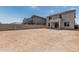 Expansive backyard with potential for landscaping and recreational use with block wall at 22831 N 183Rd Dr, Surprise, AZ 85387