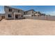 Large backyard offering ample space for outdoor activities with block wall at 22831 N 183Rd Dr, Surprise, AZ 85387