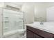 This bathroom features a shower, toilet and a modern vanity at 22831 N 183Rd Dr, Surprise, AZ 85387