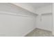 Walk-in closet with shelving and carpeted flooring at 22831 N 183Rd Dr, Surprise, AZ 85387