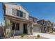 Desirable two-story home with a two-car garage, covered entrance, and low-water landscaping at 22831 N 183Rd Dr, Surprise, AZ 85387