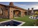 Expansive backyard with a pool and stone patio at 27256 N 97Th Pl, Scottsdale, AZ 85262