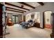 Spacious Primary bedroom with fireplace and access to private patio at 27256 N 97Th Pl, Scottsdale, AZ 85262