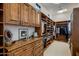 Large walk-in closet with ample shelving and hanging space at 27256 N 97Th Pl, Scottsdale, AZ 85262