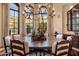 Formal dining room with a large table and stunning views at 27256 N 97Th Pl, Scottsdale, AZ 85262