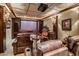 Luxurious home theater with leather seating and large screen at 27256 N 97Th Pl, Scottsdale, AZ 85262