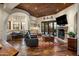 Cozy living area with a fireplace and built-in seating at 27256 N 97Th Pl, Scottsdale, AZ 85262