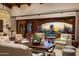 Spacious living room with views of the backyard oasis at 27256 N 97Th Pl, Scottsdale, AZ 85262