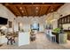 Spacious living room with high ceilings, a stone fireplace, and ample natural light at 27256 N 97Th Pl, Scottsdale, AZ 85262