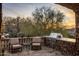 Built-in grilling station with seating area and scenic views at 27256 N 97Th Pl, Scottsdale, AZ 85262