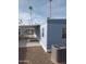 Mobile home side view, showcasing carport and AC unit at 303 S Recker Rd # 126, Mesa, AZ 85206
