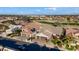 Aerial view showing two houses in a community with a golf course in the background at 3171 N 159Th Ave, Goodyear, AZ 85395
