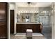 Elegant bathroom with double vanity, granite counters, and a large shower at 3171 N 159Th Ave, Goodyear, AZ 85395