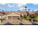 Single-story home with two-car garage, landscaping, and desert landscaping at 3171 N 159Th Ave, Goodyear, AZ 85395