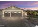 Beautiful two-car garage home with a large driveway and mature landscaping at 3171 N 159Th Ave, Goodyear, AZ 85395