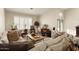 Bright and airy living room with comfortable seating and natural light at 3171 N 159Th Ave, Goodyear, AZ 85395