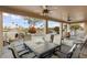 Outdoor patio with seating area and a view of the golf course at 3171 N 159Th Ave, Goodyear, AZ 85395