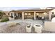 Covered patio with seating area and outdoor kitchen at 3171 N 159Th Ave, Goodyear, AZ 85395